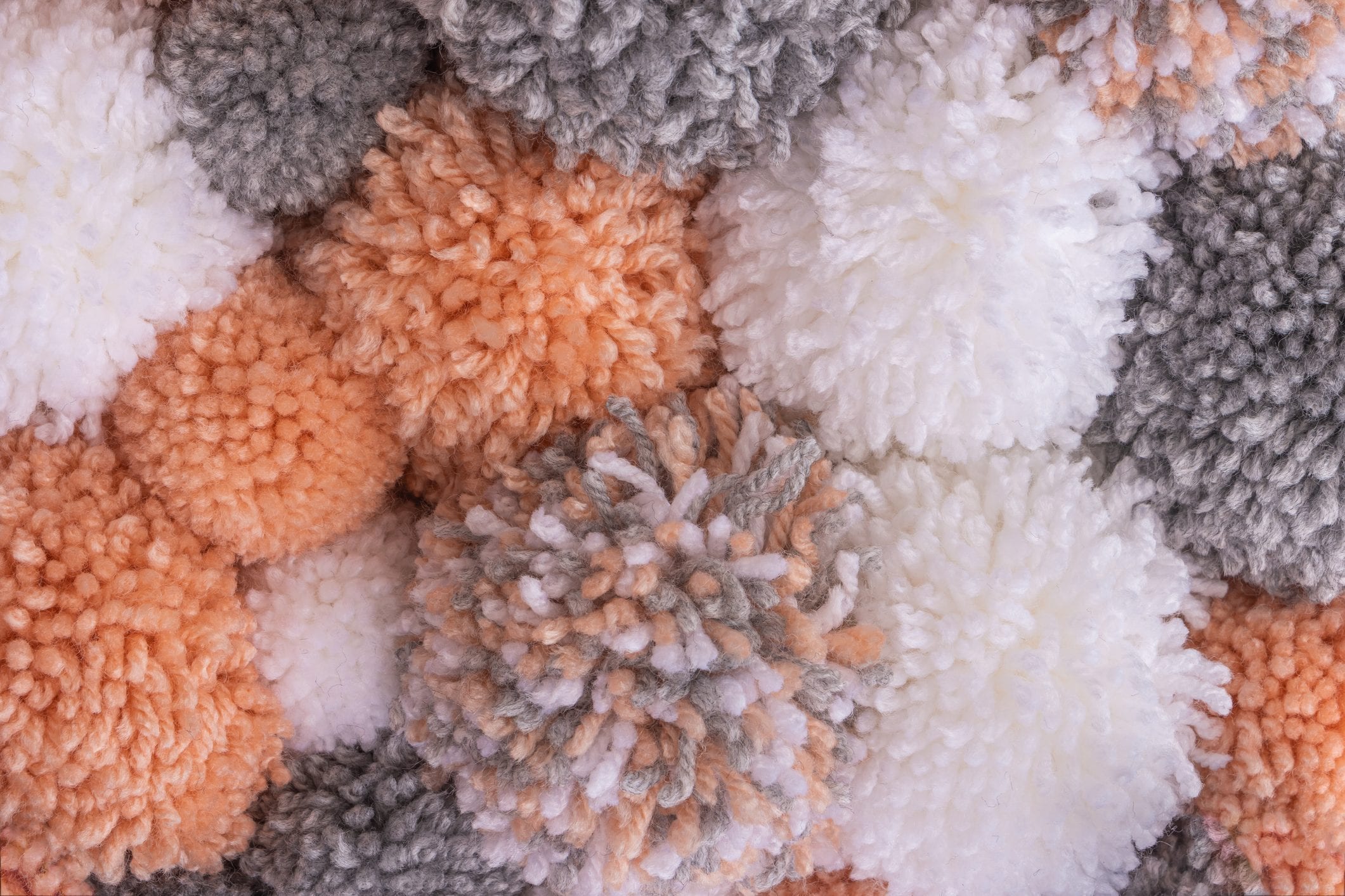 Come realizzare un tappeto pompon